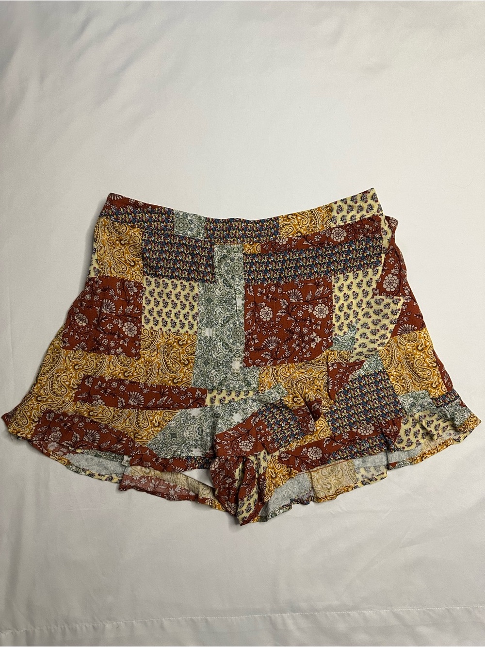 Altar'd State patchwork skort with brown, beige, and blue paisley and floral pri